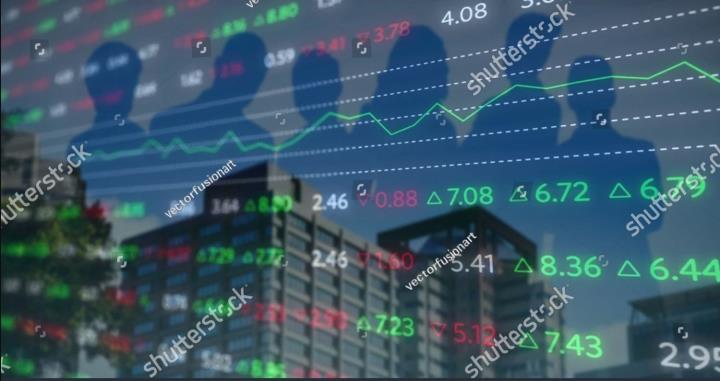 Image of stock market and business people over cityscape. Global business and technology concept, digitally generated image.